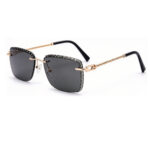 Gold twisted metal temple rimless sunglasses black carved edge lens