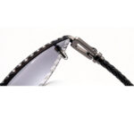 Close view of precision metal hinge and diamond cut lens edge of rimless shades